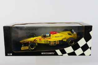 Minichamps- A boxed 1:18 scale Jordan 197 Peugeot 197 Giancarlo Fisichella car which appears Mint