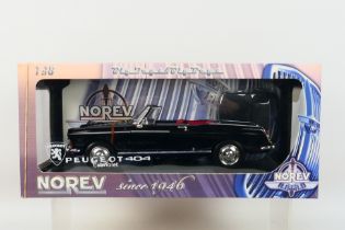 Norev - A boxed Norev #184763 1:18 scale 1965 Peugeot 404 Cabriolet.