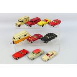 Spot-On - Dinky Toys - Corgi Toys - An unboxed group of 10 playworn diecast model vehicles.