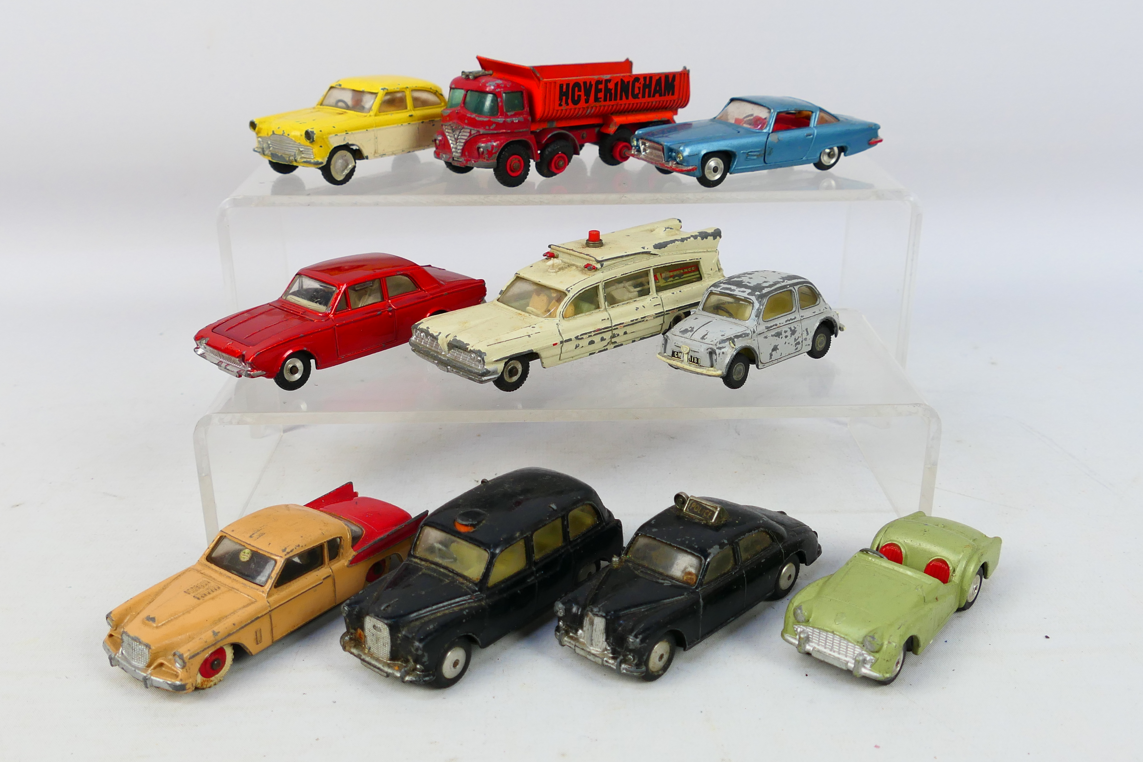 Spot-On - Dinky Toys - Corgi Toys - Matchbox - An unboxed collection of 10 playworn diecast model