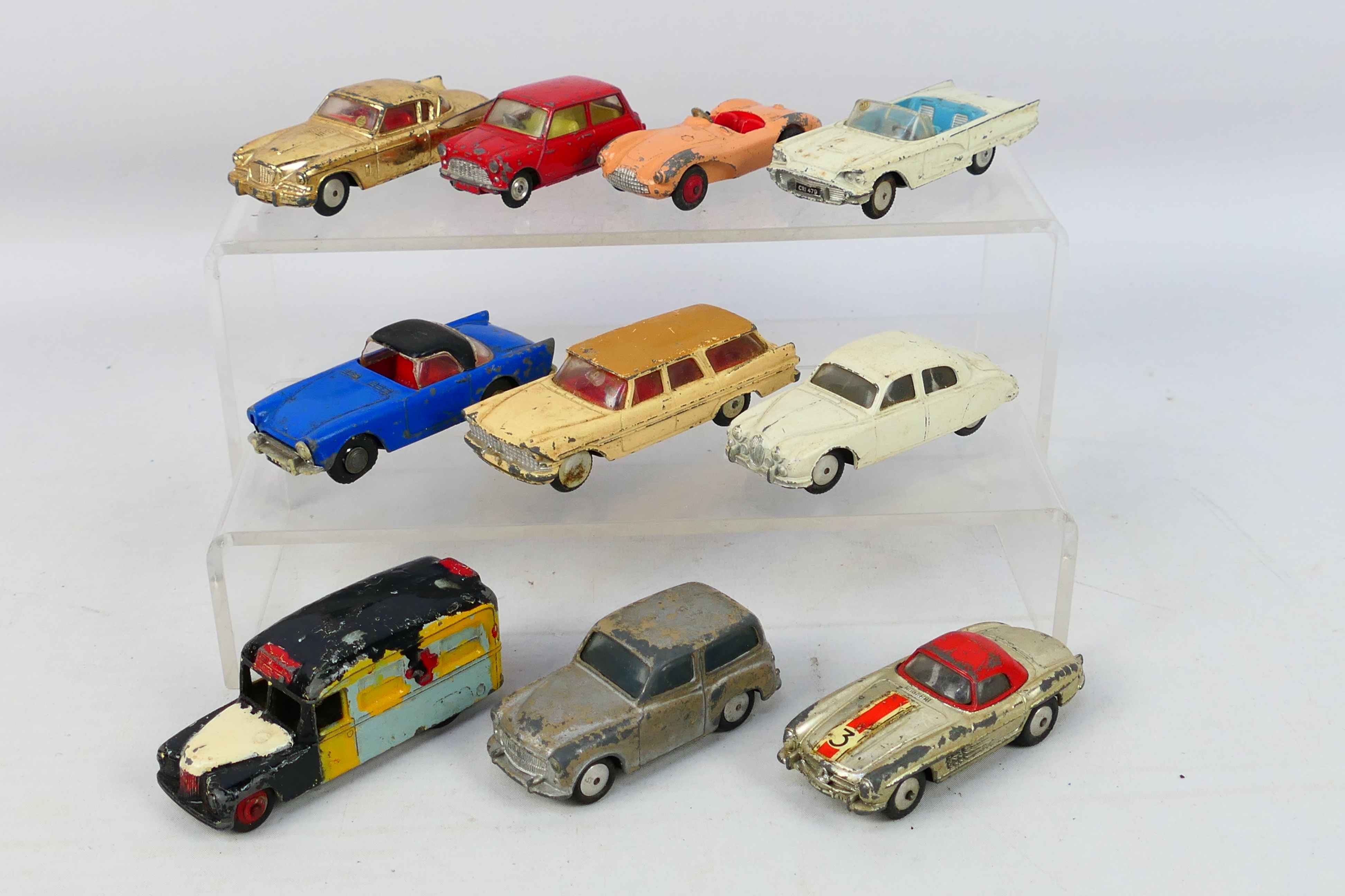 Spot-On - Dinky Toys - Corgi Toys - 10 unboxed playworn diecast model vehicles.