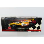 Minichamps- A boxed 1:18 scale Renault F1 Team R29 2009 car which appears Mint in a Good box with