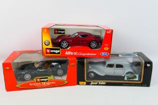 Bburago - Maisto - Three boxed diecast 1:18 scale model cars.