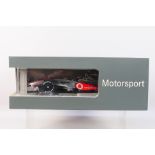 Minichamps - A boxed 1:18 scale Mercedes dealer edition Vodafone McLaren Mercedes MP4-24 Heikki