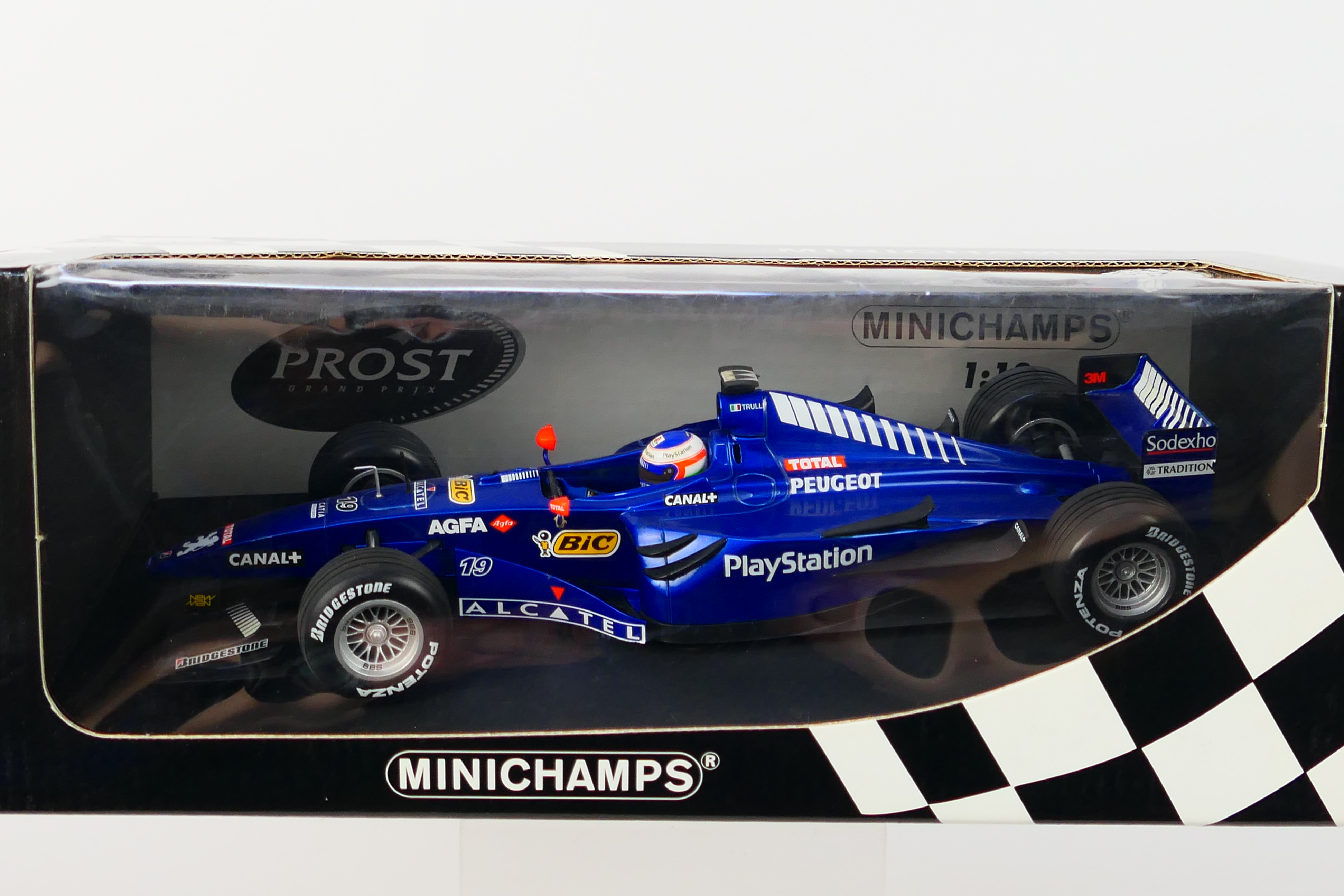 Minichamps- A boxed 1:18 scale Prost Peugeot AP02 Jarno Trulli 1999 car which appears Mint in a - Image 2 of 3