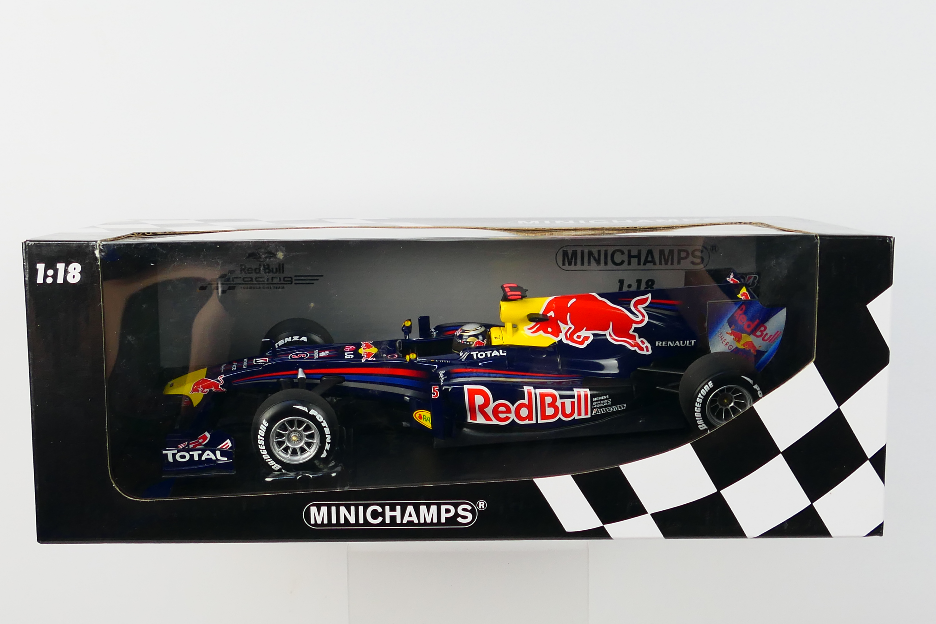 Minichamps- A boxed 1:18 scale Red Bull Racing Renault RB6 Sebastian Vettel 2010 car which appears