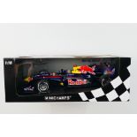 Minichamps- A boxed 1:18 scale Red Bull Racing Renault RB6 Sebastian Vettel 2010 car which appears