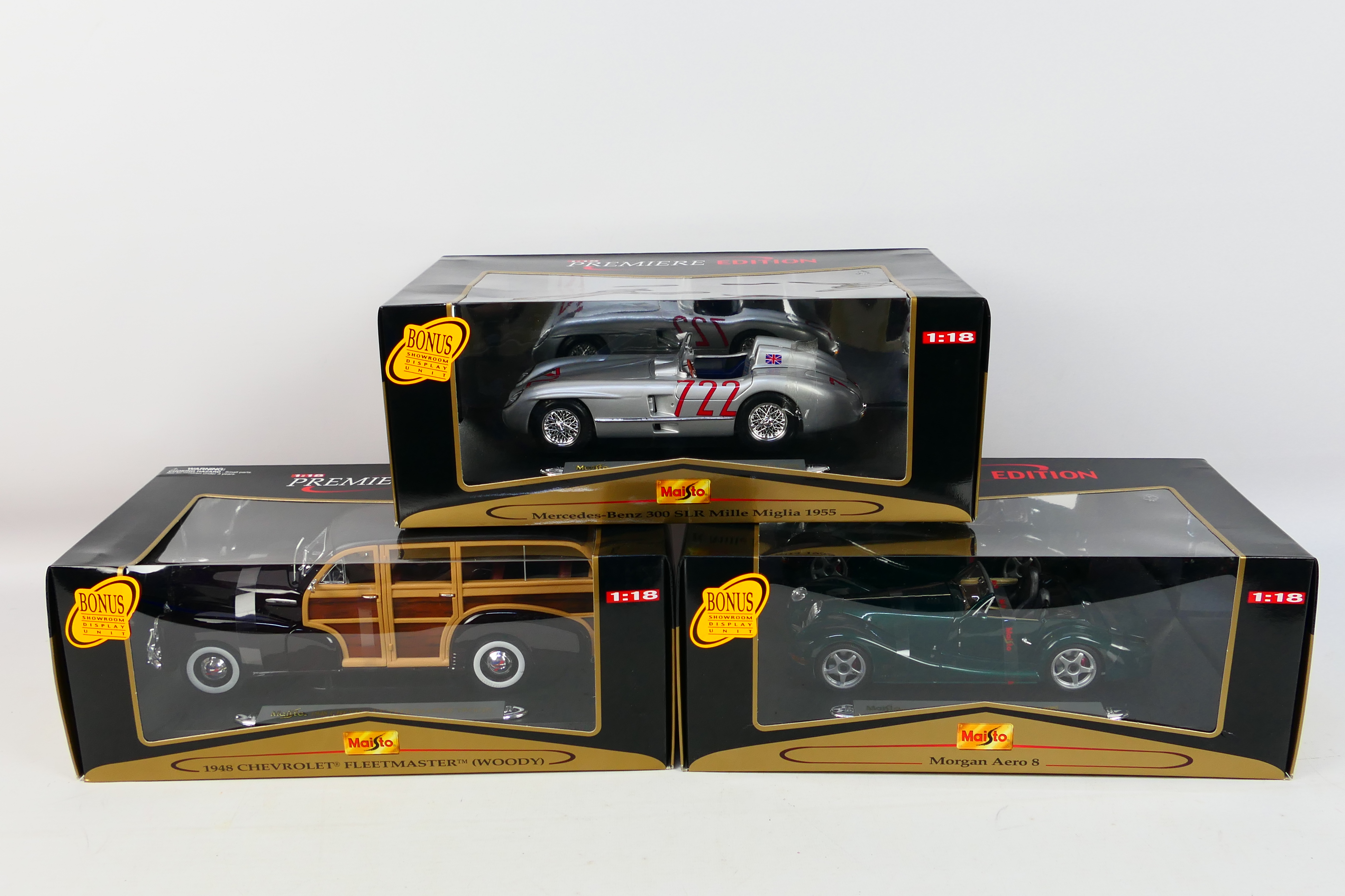 Maisto - Three boxed Maisto 'Premiere Edition' 1:18 scale diecast model cars.