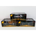 Maisto - Three boxed Maisto 'Premiere Edition' 1:18 scale diecast model cars.