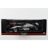 Minichamps- A boxed 1:18 scale McLaren Mercedes MP4/15 Mikka Hakkinen car which appears Mint in a