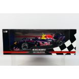 Minichamps - A boxed 1:18 scale Red Bull Racing Renault RB5 Sebastian Vettel 2009 car # 150090015.