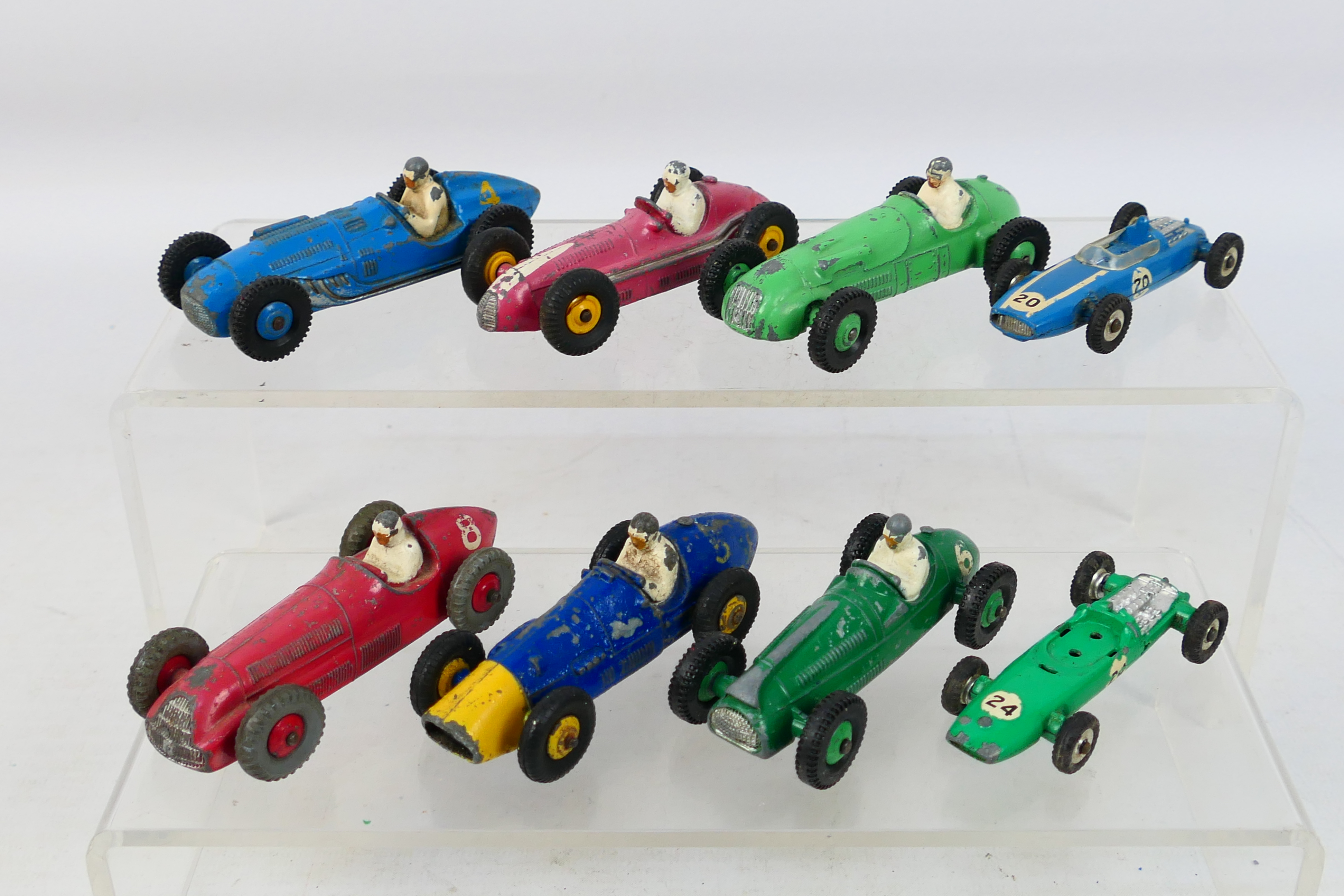 Dinky Toys - 8 playworn diecast model racing cars from Dinky.