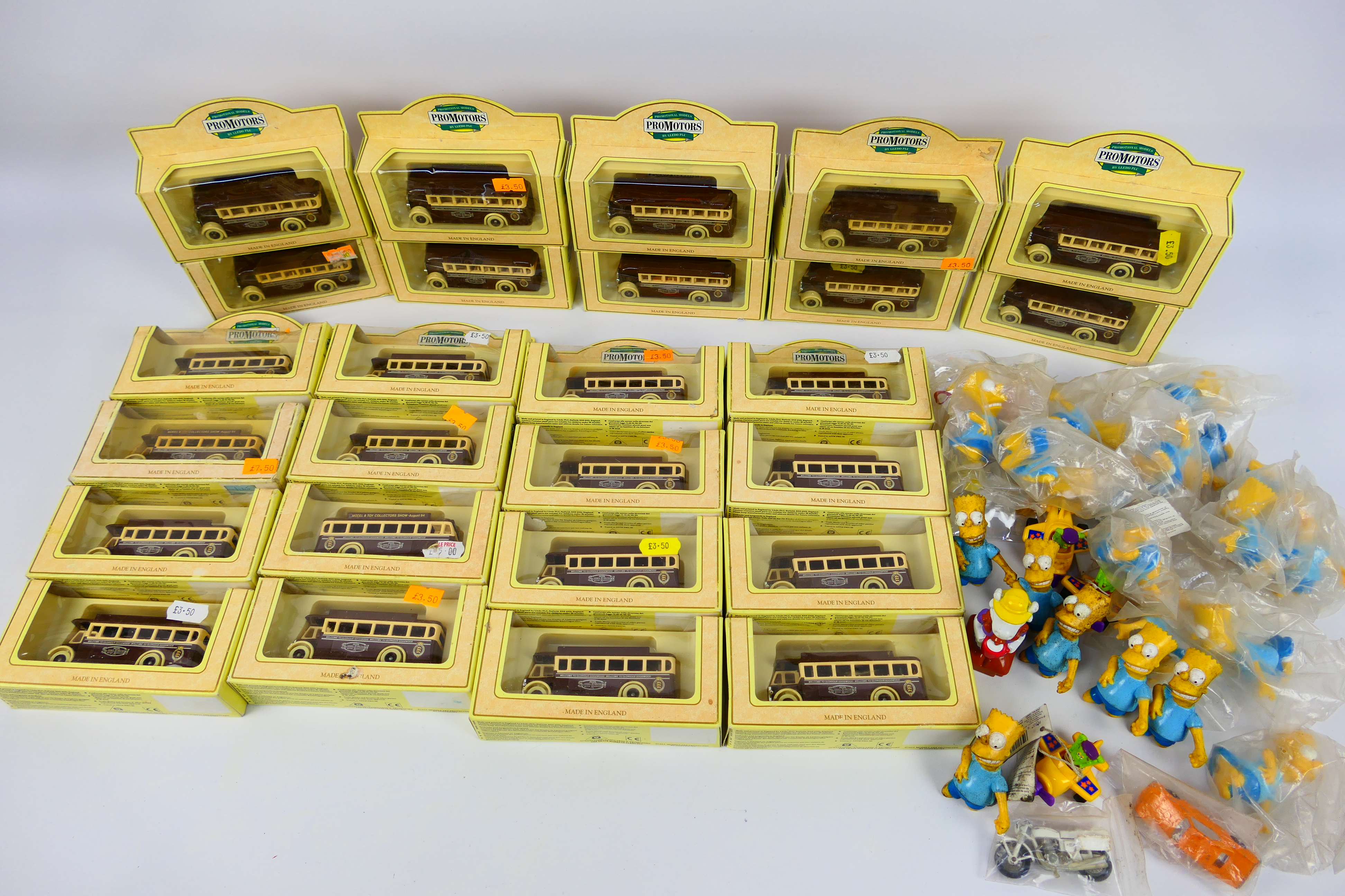 Lledo - Disney - 26 x boxed bus models with Welcome to Goodwood 94 livery and a quantity of plastic