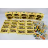 Lledo - Disney - 26 x boxed bus models with Welcome to Goodwood 94 livery and a quantity of plastic
