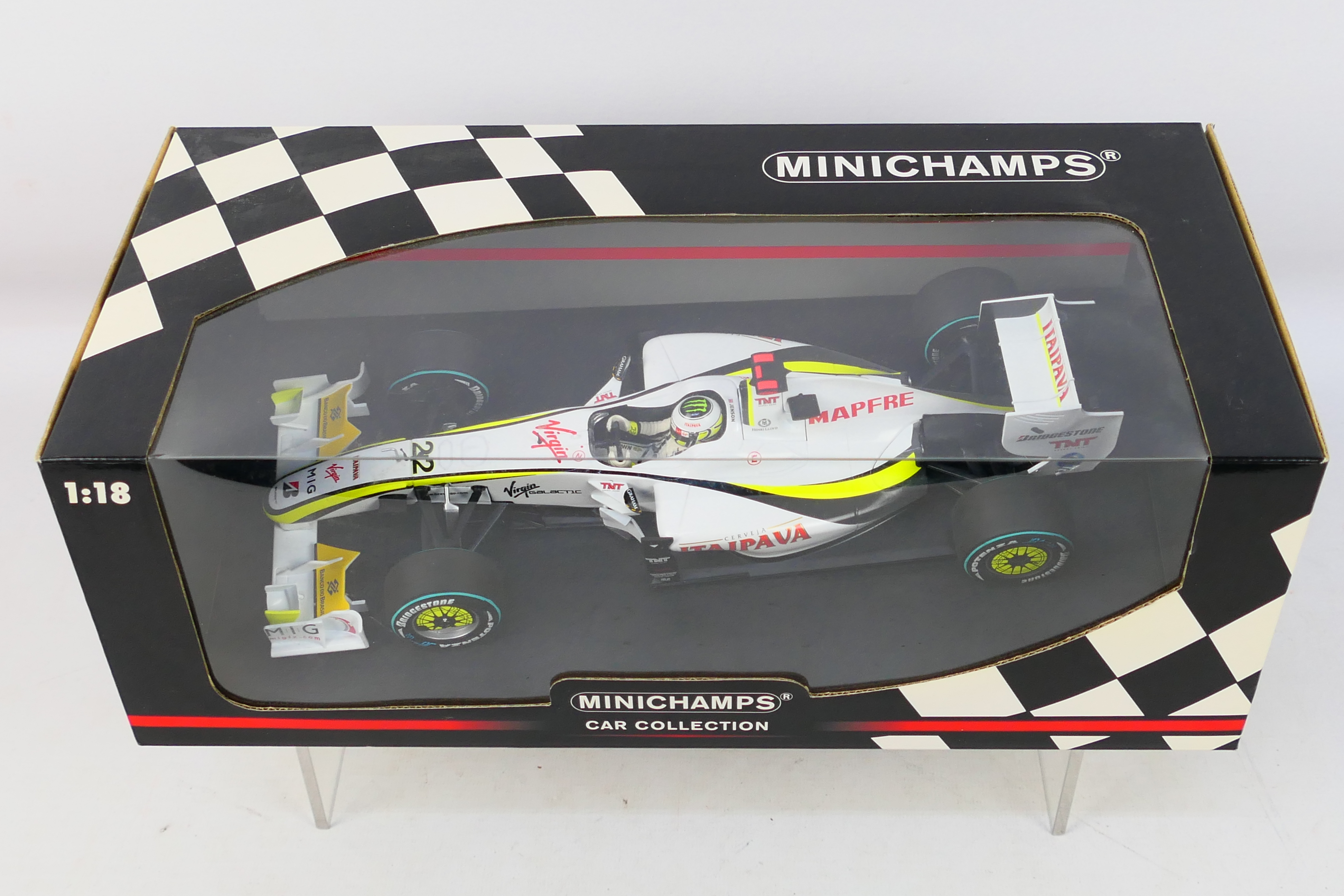 Minichamps - A boxed limited edition 1:18 scale Brawn GP BGP 001 Jenson Button 2009 car # 150090622. - Image 2 of 2