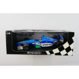 Minichamps- A boxed 1:18 scale Benetton Formula 1 Playlife B199 Alexander Wurz 1999 car which