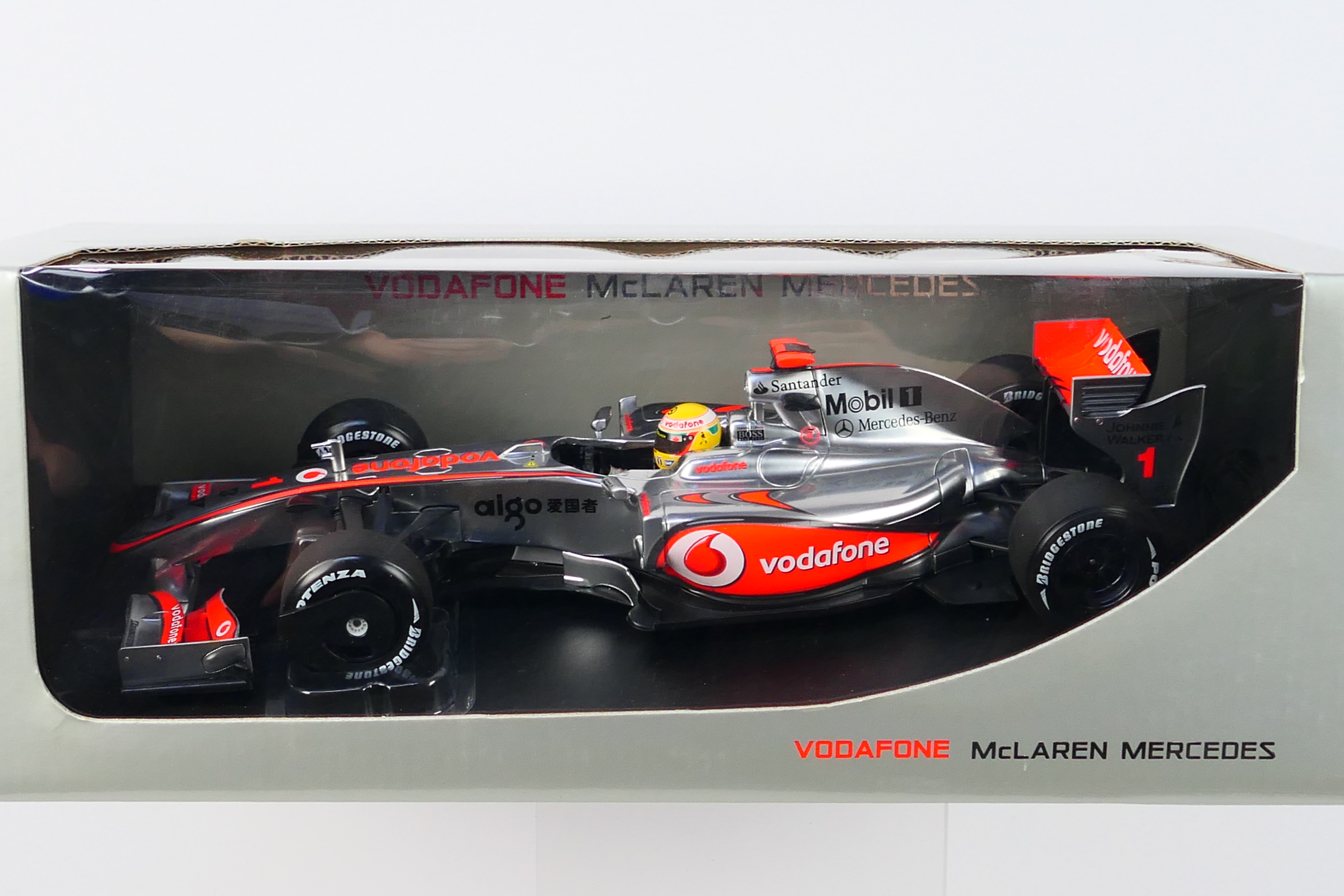 Minichamps - A boxed 1:18 scale McLaren Mercedes MP4-24 Lewis Hamilton 2009 car # 503091801. - Image 2 of 3