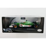 Hot Wheels - A boxed 1:18 scale Jaguar R2 Pedro De La Rosa car which appears Mint in a Good box