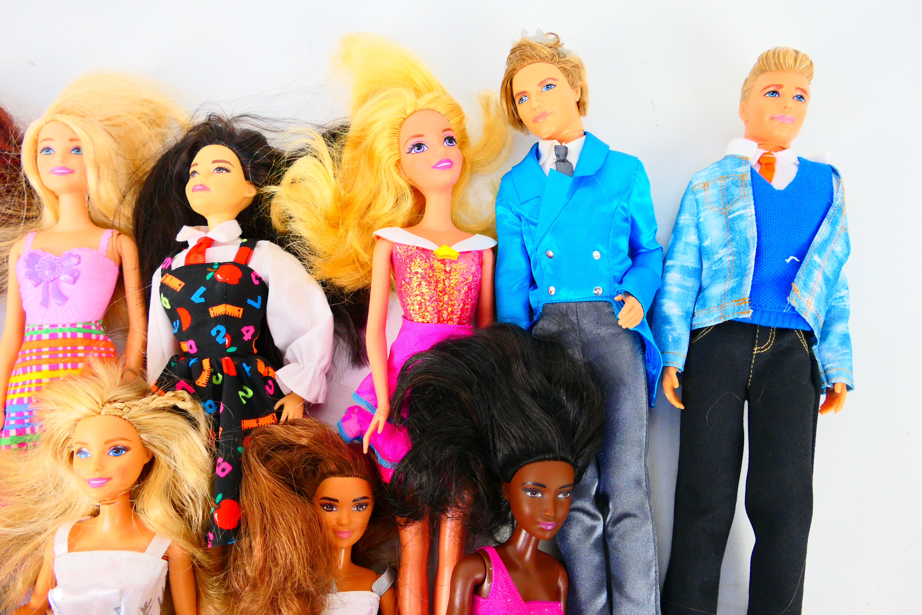 Mattel - Barbie - Ken - An unboxed collection of 11 modern Barbie dolls, in a variety of outfits. - Image 4 of 4