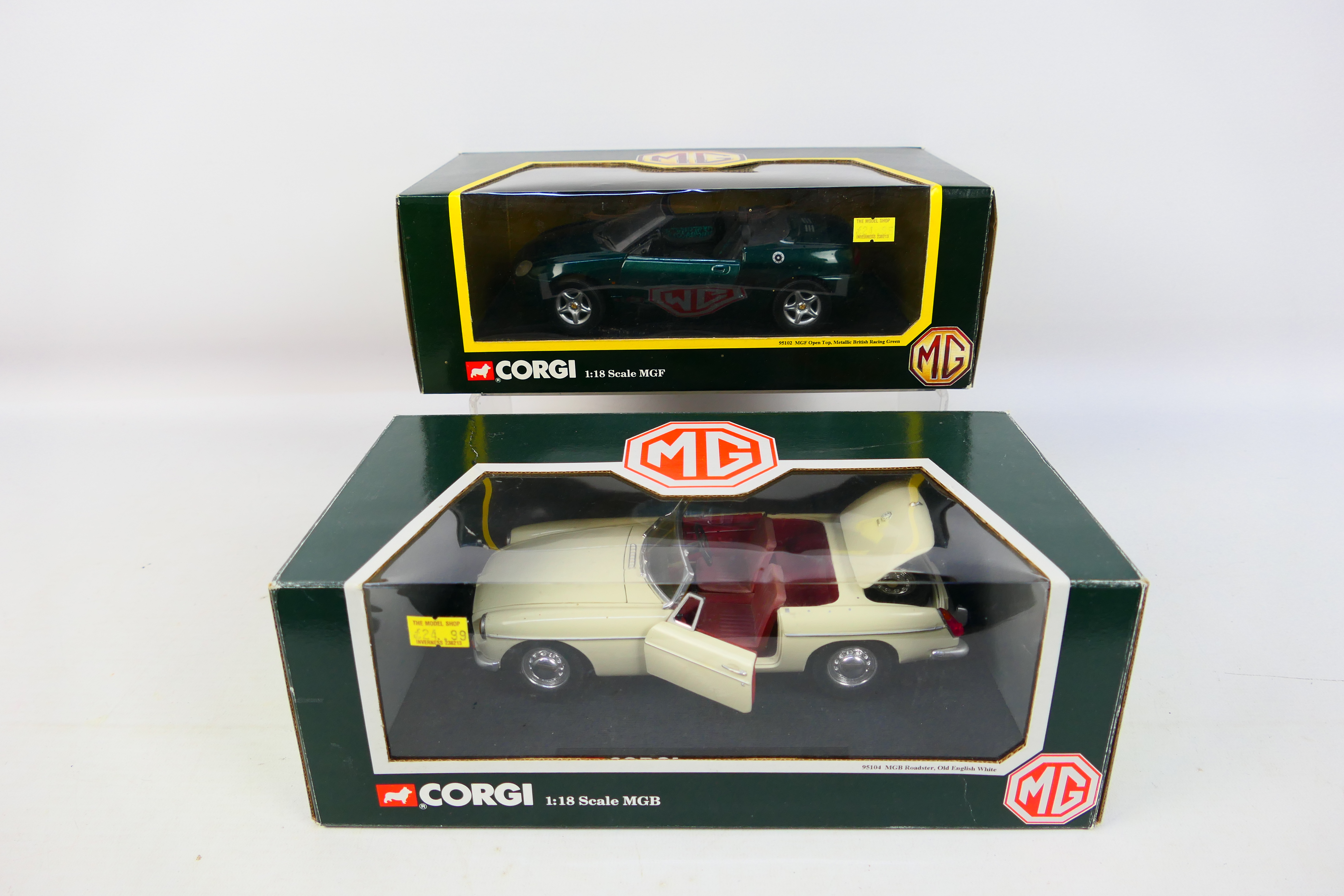 Corgi - Two boxed 1:18 scale diecast MG models. Lot consists of Corgi #95102 MGF 1.