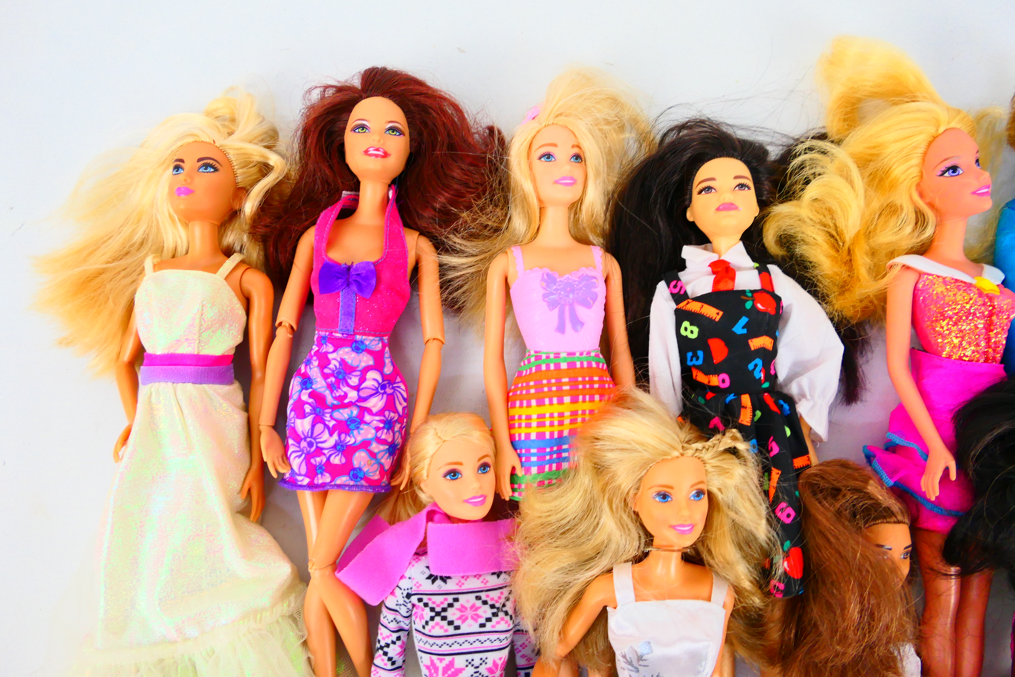 Mattel - Barbie - Ken - An unboxed collection of 11 modern Barbie dolls, in a variety of outfits. - Image 3 of 4