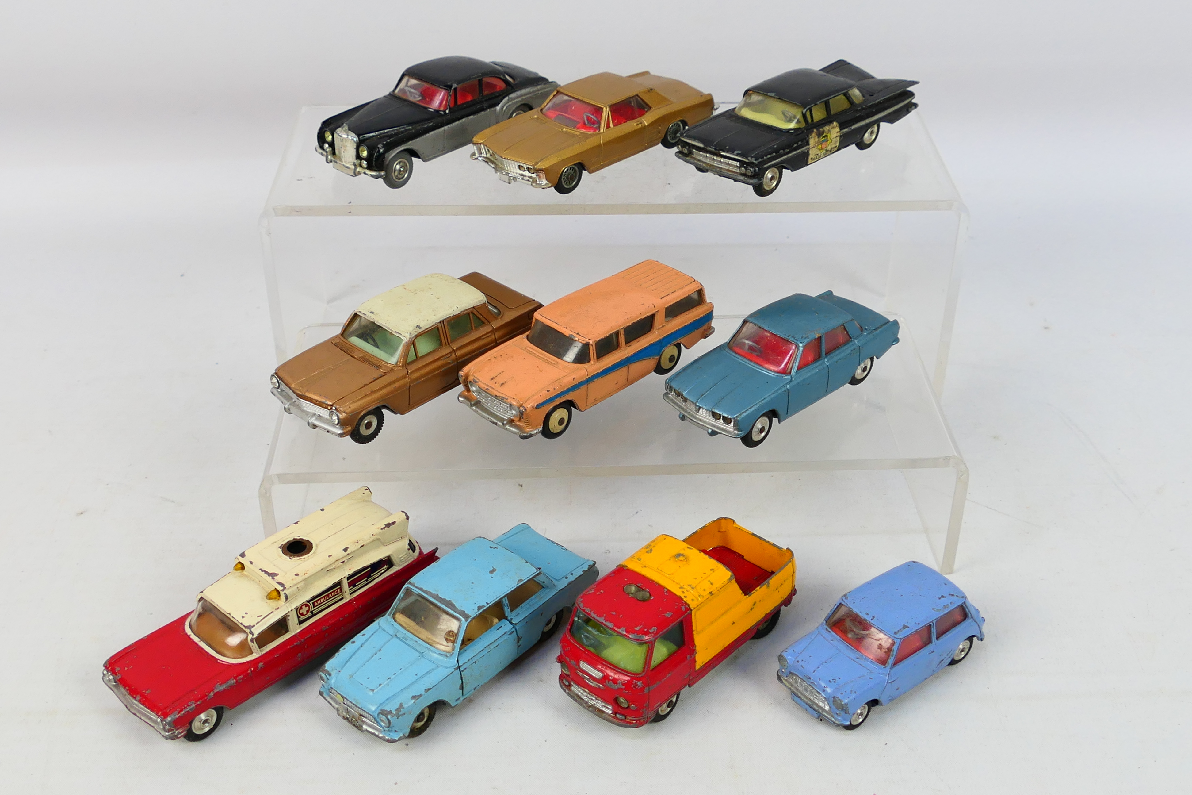 Dinky Toys - Corgi Toys - An unboxed group of 10 playworn diecast model vehicles.
