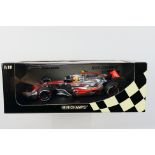 Minichamps - A boxed limited edition 1:18 scale McLaren Mercedes MP4-22 Lewis Hamilton 1st win