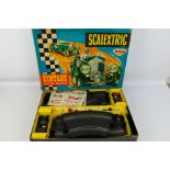 Scalextric - A boxed Scalextric 'Vintage Motor Racing' set # V33. Includes C64 Bentley 4.