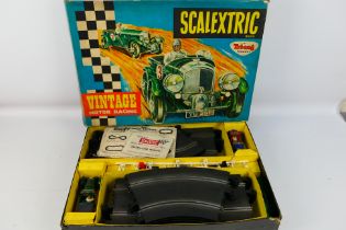 Scalextric - A boxed Scalextric 'Vintage Motor Racing' set # V33. Includes C64 Bentley 4.