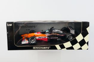 Minichamps- A boxed 1:18 scale Arrows A20 Toranosuke Takagi 1999 car which appears Mint in a Good