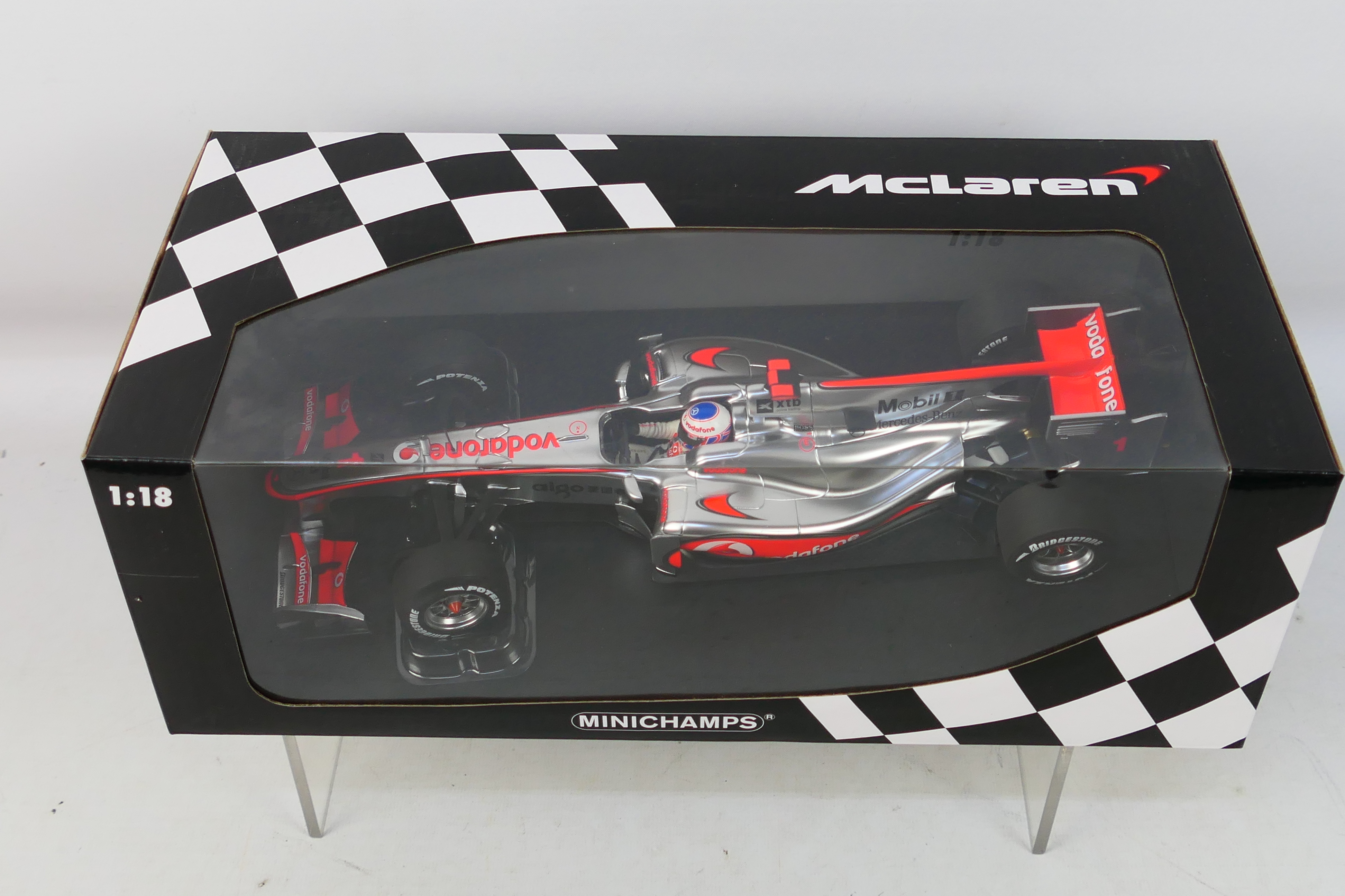 Minichamps- A boxed 1:18 scale McLaren Mercedes MP4-25 Jenson Button car which appears Mint in a - Image 2 of 2
