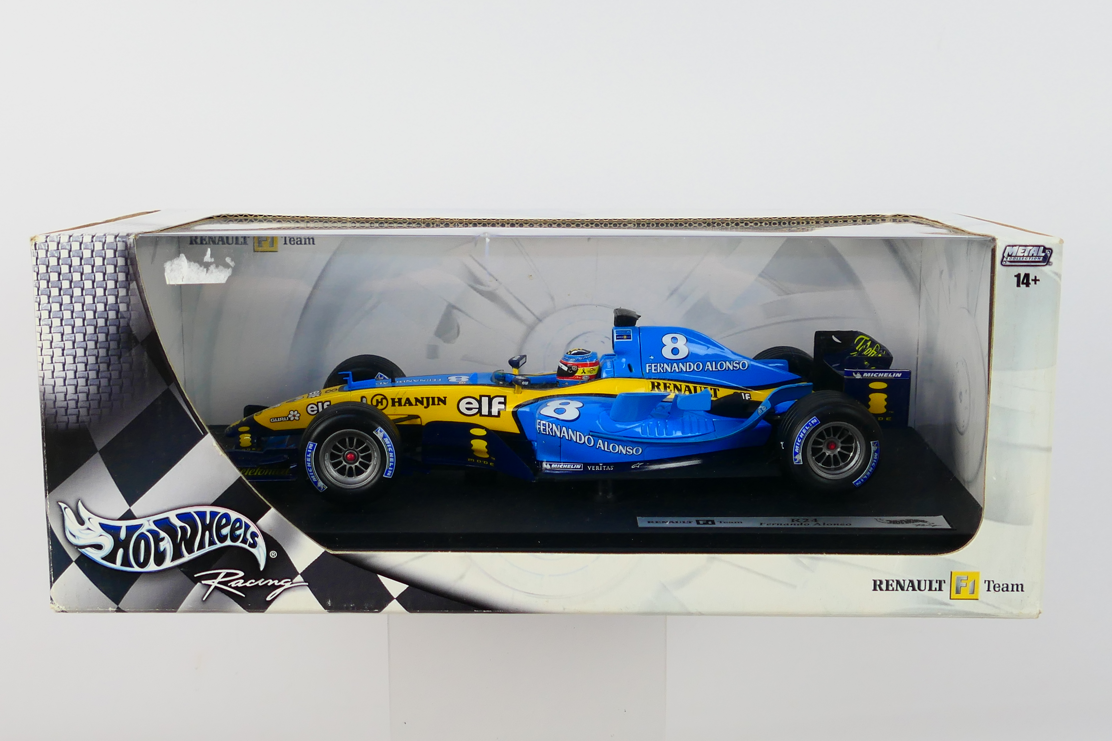 Hot Wheels - A boxed 1:18 scale Renault R24 Fernando Alonso car which appears Mint in a Good box
