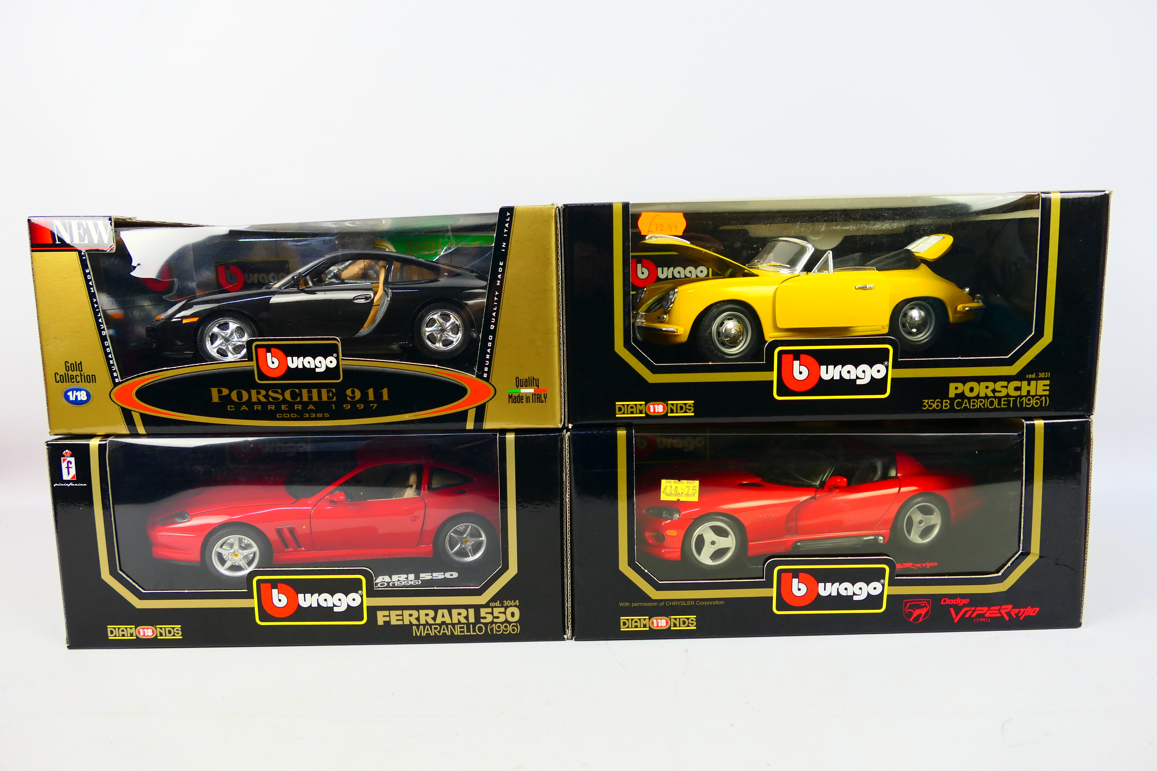 Bburago - Four boxed diecast 1:18 scale model cars from Bburago.