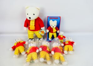 Golden Bear Products - Other - A sleuth of 8 mainly loose Rupert the Bear soft / plush toys in a