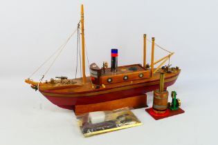 Model Boat - A probably scratch built wooden boat measuring 63 cm x 41 x 15 on stand.