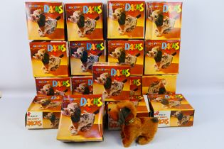 Skippy - Wind-up - Unused shop stock - A collection of 18 Skippy Dachs (#1772) wind-up dogs appear