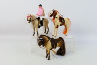 Julip - A group of unboxed models, a horse called Malteser with tack,