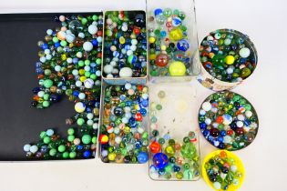 Vintage Marbles - A collection of over 700 vintage glass marbles in various sizes and styles,