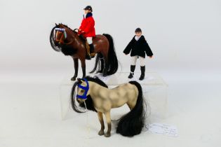 Julip - A group of unboxed models, a Bay horse called Barney with tack and a rider named Charlie,