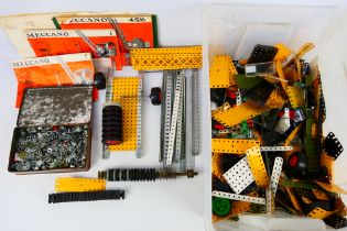 Meccano - A mixed collection of loose Meccano parts to include wheels, plates,