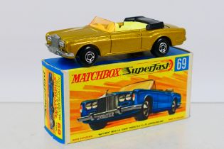 Matchbox - Superfast - A boxed Rolls Royce Silver Shadow drop head in gold with dark grey base # 69.
