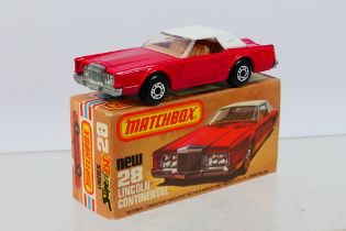 Matchbox - Superfast - A boxed Lincoln Continental with light brown interior # 28 which appears