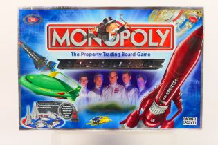 Hasbro - Monopoly - An unopened Thunderbirds Edition Monopoly set 2004 issue.
