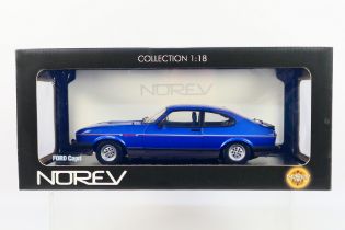 Norev - A boxed 1:18 scale Ford Capri 2.8 injection in blue over silver # 182710.