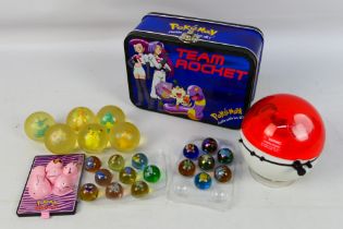 Pokemon - A Team Rocket tin with 6 x bou