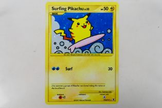 Pokemon - Surfing Pikachu Cosmo Holo Sec