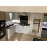 Cream shaker kitchen display with appliances