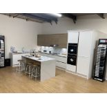 Chalk and oak kitchen display with island unit with appliances