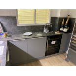 Grey with yellow open units kitchen display with appliances