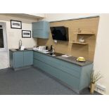 Blue handleless display kitchen with appliances